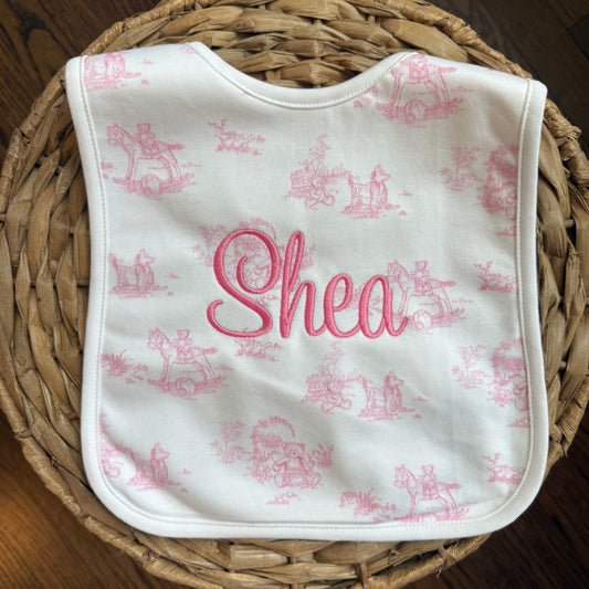 Pink toile feeding bib "Shea"